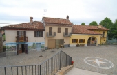 RDN010, Overlooking the main square of Roddino, a large village house in need of restoration